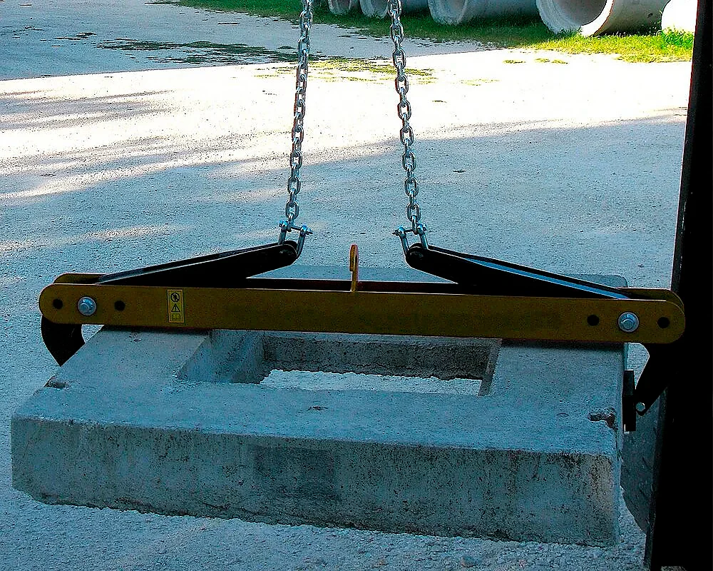 Clamp for manhole covers and concrete slabs