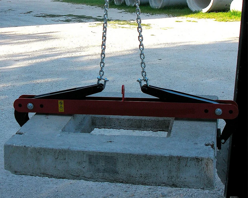 Clamp for manhole covers and concrete slabs